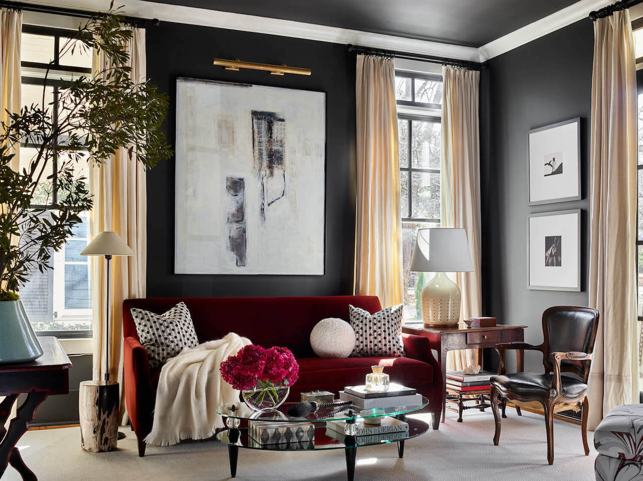 living room black walls red sofa